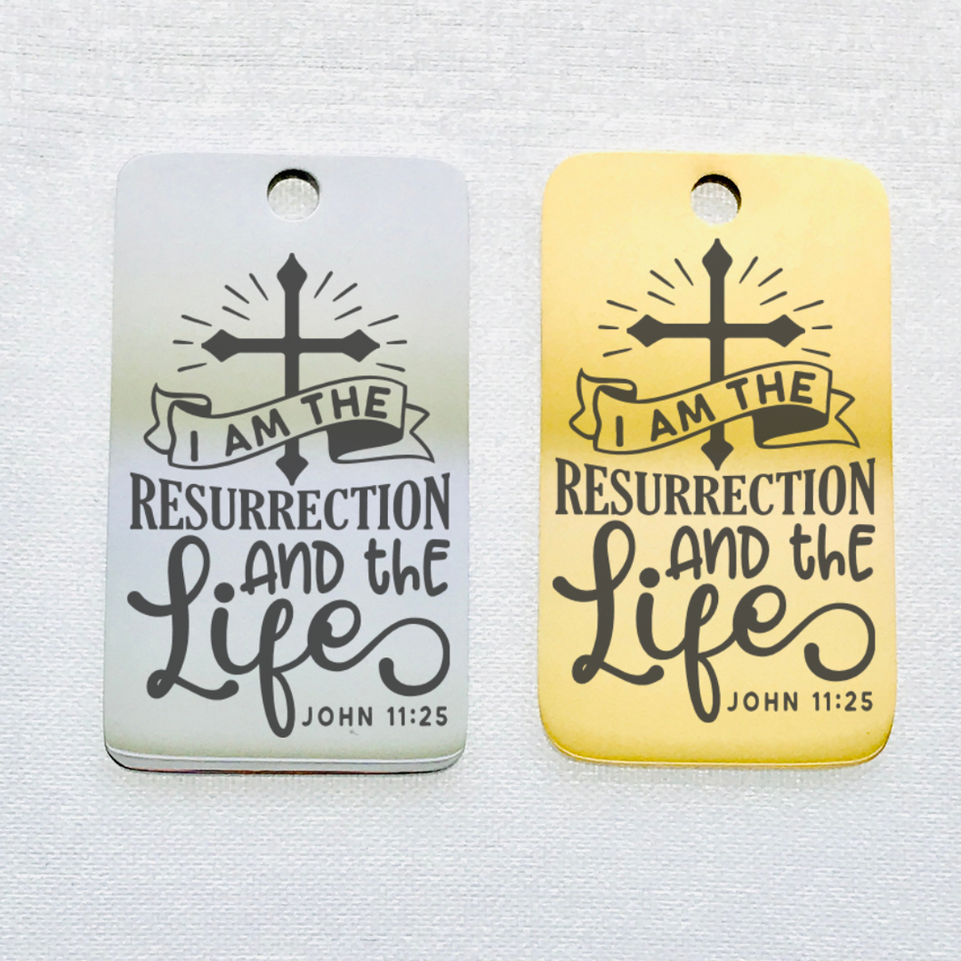 I AM THE RESURRECTION STAINLESS STEEL CHARM